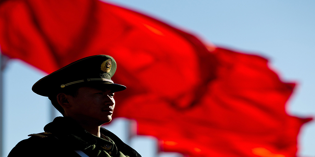 A Chinese paramilitary policeman stands guard on Tiananmen Square while a sessions of the National People's Congress and the Chinese People's Political Consultative Conference are held at the Great Hall of the People in Beijing Monday, March 4, 2013. In a rare move, China on Monday declined to reveal its defense budget request for 2013. It has been customarily that the country announces its defense spending plan for a new year at a press conference that is held a day before the opening of an annual session of the National People's Congress, China's parliament. (AP Photo/Andy Wong)