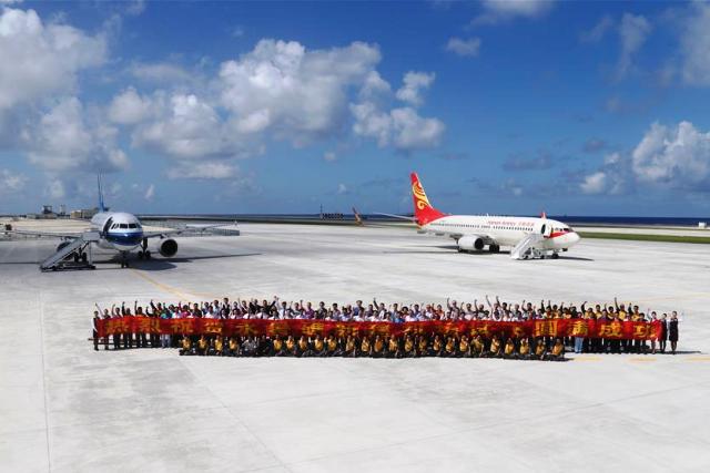 China Southern Airlines plane lands at the airfield on Fiery Cross Reef (Kagitingan Reef in the Philippines) in the South China Sea on Wednesday, Jan. 6, 2016. Xinhua/Cha Chunming